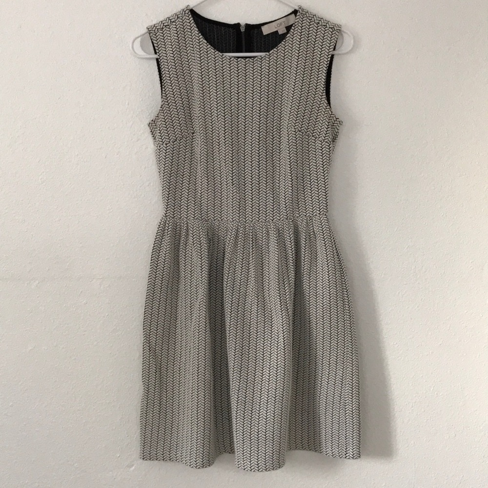 black and woven patterned dress